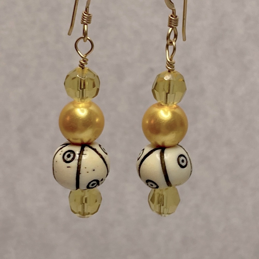 Carved bone gold glass pearl beaded earrings dangle
